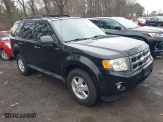 2010 Ford Escape XLT with VIN 1FMCU9DG6AKC41690, listed as a IAAI auction lot 42035749 with 137,268 mi miles. Bid and sale history available at carsss.com. Image 1.
