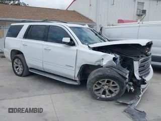 2016 GMC Yukon SLT with VIN 1GKS1BKC3GR219537, listed as a IAAI auction lot 42060846 with 1 mi miles. Bid and sale history available at carsss.com. Image 1.