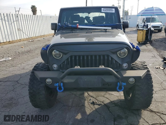 2017 Jeep Wrangler Sport with VIN 1C4GJWAG9HL576707, listed as a Copart auction lot 43285955 with 113,692 mi miles and Salvage Title. Bid and sale history available at DreamBid. Image 5.