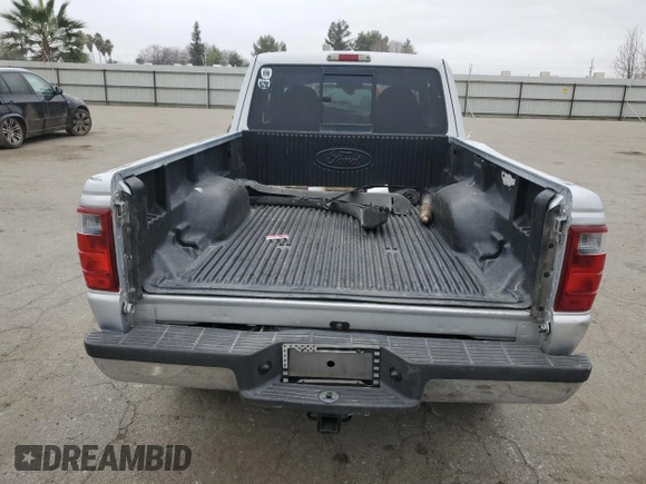 2002 Ford Ranger XLT Off-Road z VIN 1FTZR45U12TA27368, wystawiony jako Copart lot #87229374 z przebiegiem 111 159 mil mil oraz Szkoda całkowita • Salvage title. Historia ofert i sprzedaży dostępna na DreamBid. Obrazek 6.