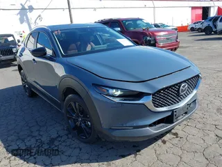 2023 Mazda CX-30 S Carbon Edition with VIN 3MVDMBCM1PM557862, listed as a IAAI auction lot 41966734 with 36,757 mi miles and . Bid and sale history available at DreamBid. Image 1.