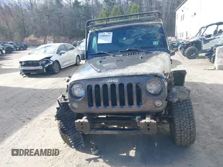2014 Jeep Wrangler Unlimited Sahara с VIN 1C4BJWEG3EL267279, выставлен на аукционе IAAI как лот 42083836 с пробегом 81 796 миль миль и . История ставок и продаж доступна на DreamBid. Изображение 6.