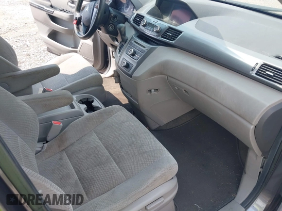 2014 Honda Odyssey LX z VIN 5FNRL5H27EB007683, wystawiony jako IAAI lot #42427304 z przebiegiem 325 359 mil mil oraz . Historia ofert i sprzedaży dostępna na DreamBid. Obrazek 5.