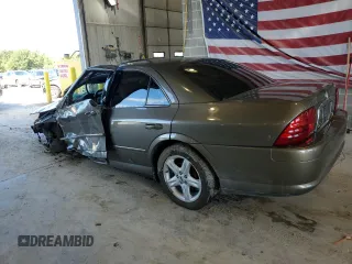 2001 Lincoln LS Sport z VIN 1LNHM87A61Y605692, wystawiony jako Copart lot #54598955 z przebiegiem Nie podano mil oraz Szkody całkowita. Historia ofert i sprzedaży dostępna na DreamBid. Obrazek 2.