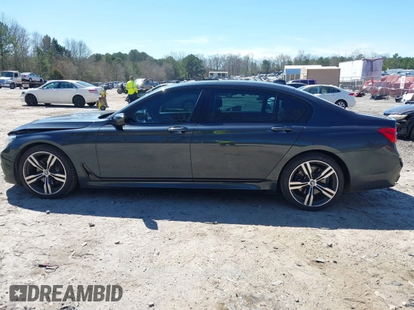 2016 BMW 7 Series 740i with VIN WBA7E2C54GG714649, listed as a IAAI auction lot 41815220 with 89,029 mi miles. Bid and sale history available at carsss.com. Image 14.