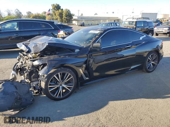 2020 Infiniti Q60 Luxe with VIN JN1EV7EK5LM340867, listed as a Copart auction lot 74390004 with 69,613 mi miles and Salvage Title. Bid and sale history available at carsss.com. Image 1.