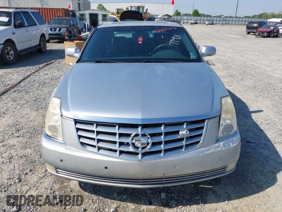2006 Cadillac DTS 1SD z VIN 1G6KD57Y86U110272, wystawiony jako IAAI lot #42059673 z przebiegiem 147 610 mil mil oraz . Historia ofert i sprzedaży dostępna na DreamBid. Obrazek 6.