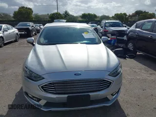 2018 Ford Fusion SE z VIN 3FA6P0LU2JR281231, wystawiony jako IAAI lot #41963083 z przebiegiem 115 434 mil mil oraz . Historia ofert i sprzedaży dostępna na DreamBid. Obrazek 12.