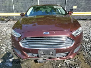 2016 Ford Fusion SE Hybrid z VIN 3FA6P0LU5GR377735, wystawiony jako Copart lot #58791955 z przebiegiem 135 798 mil mil oraz Szkoda całkowita • Salvage title. Historia ofert i sprzedaży dostępna na DreamBid. Obrazek 5.