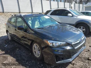 2017 Subaru Impreza Premium with VIN 4S3GTAD65H3716428, listed as a IAAI auction lot 41942299 with 77,181 mi miles. Bid and sale history available at carsss.com. Image 1.