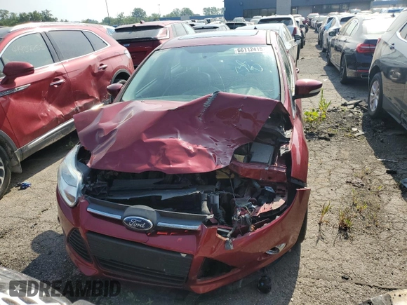 2013 Ford Focus SE z VIN 1FADP3F27DL114711, wystawiony jako Copart lot #66112415 z przebiegiem 121 197 mil mil oraz Czysty tytuł • Clean title. Historia ofert i sprzedaży dostępna na DreamBid. Obrazek 5.