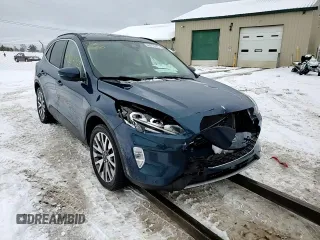 2020 Ford Escape Titanium Hybrid z VIN 1FMCU9DZ0LUA74302, wystawiony jako Copart lot #48614065 z przebiegiem 91 923 mil mil oraz Szkoda całkowita • Salvage title. Historia ofert i sprzedaży dostępna na DreamBid. Obrazek 14.