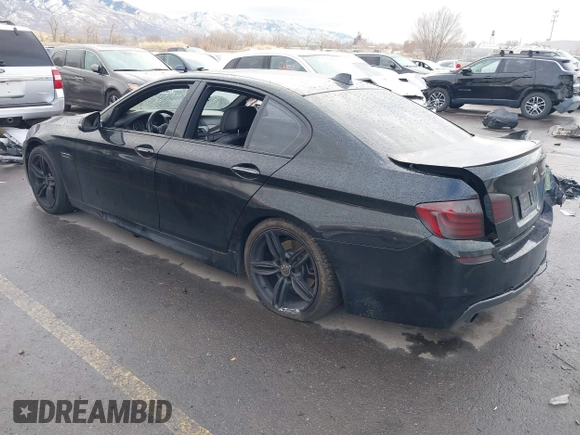 2015 BMW 5 Series 535i with VIN WBA5B1C51FG125924, listed as a IAAI auction lot 41060431 with 102,957 mi miles and . Bid and sale history available at carsss.com. Image 3.