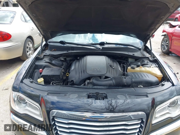 2012 Chrysler 300 with VIN 2C3CCAET1CH284661, listed as a IAAI auction lot 41920717 with 123,505 mi miles. Bid and sale history available at carsss.com. Image 10.