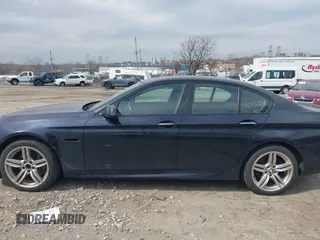 2013 BMW 5 Series 535i xDrive with VIN WBAFU7C51DDU75974, listed as a IAAI auction lot 41837789 with 216,394 mi miles and . Bid and sale history available at carsss.com. Image 13.