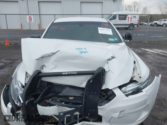 2018 Ford Police Interceptor with VIN 1FAHP2MK6JG137027, listed as a IAAI auction lot 42077115 with 123,851 mi miles and . Bid and sale history available at DreamBid. Image 12.