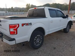2019 Ford F-150 XL with VIN 1FTEW1E45KKE21872, listed as a IAAI auction lot 40704365 with 112,221 mi miles and . Bid and sale history available at DreamBid. Image 4.