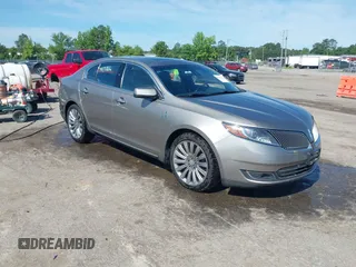 2015 Lincoln MKS с VIN 1LNHL9EK9FG605347, выставлен на аукционе IAAI как лот 42241372 с пробегом 89 816 миль миль и . История ставок и продаж доступна на DreamBid. Изображение 1.