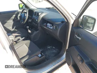 2011 Jeep Patriot Latitude with VIN 1J4NT1GA3BD220000, listed as a IAAI auction lot 41703041 with 138,945 mi miles. Bid and sale history available at carsss.com. Image 5.