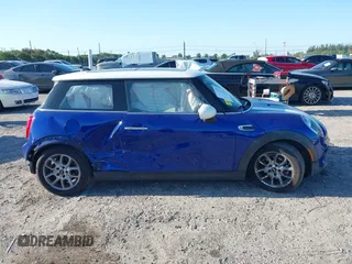 2019 MINI Hardtop Cooper with VIN WMWXP5C52K2H97728, listed as a IAAI auction lot 42026666 with 61,464 mi miles and . Bid and sale history available at DreamBid. Image 13.