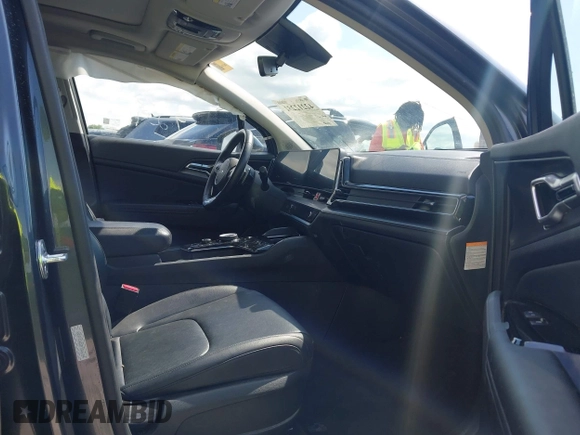 2023 Kia Sportage EX with VIN KNDPVCAG2P7046184, listed as a IAAI auction lot 42212231 with 25,212 mi miles and . Bid and sale history available at DreamBid. Image 5.