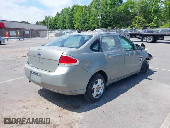 2008 Ford Focus SE with VIN 1FAHP35N68W198442, listed as a IAAI auction lot 39509774 with 180,247 mi miles. Bid and sale history available at carsss.com. Image 4.