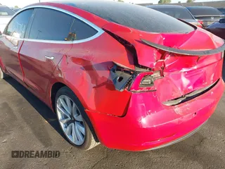 2018 Tesla Model 3 Long Range Battery with VIN 5YJ3E1EA3JF035785, listed as a IAAI auction lot 41986774 with 33,965 mi miles and . Bid and sale history available at DreamBid. Image 20.