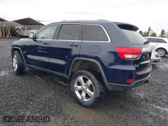 2012 Jeep Grand Cherokee Laredo with VIN 1C4RJFAG9CC220145, listed as a IAAI auction lot 41798457 with 130,603 mi miles. Bid and sale history available at carsss.com. Image 3.