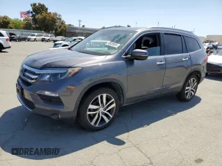 2018 Honda Pilot Touring с VIN 5FNYF6H97JB055541, выставлен на аукционе Copart как лот 58528925 с пробегом 86 244 миль миль и Списание • Salvage title. История ставок и продаж доступна на DreamBid. Изображение 1.