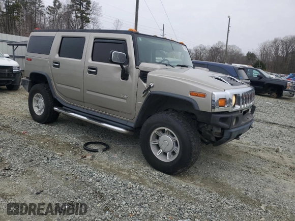 2004 Hummer H2 with VIN 5GRGN23U24H118230, listed as a Copart auction lot 87764075 with 202,206 mi miles and Salvage Title. Bid and sale history available at carsss.com. Image 4.