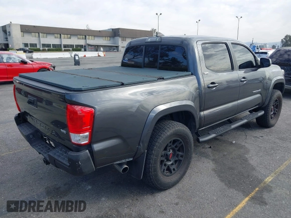2017 Toyota Tacoma SR5 with VIN 3TMAZ5CN7HM036078, listed as a IAAI auction lot 41698163 with 91,376 mi miles. Bid and sale history available at carsss.com. Image 4.