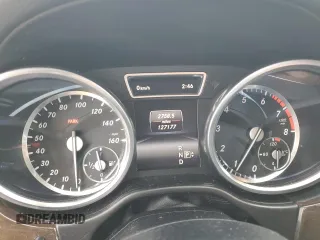 2016 Mercedes-Benz GL with VIN 4JGDF6EE6GA628166, listed as a Copart auction lot 77303654 with 127,177 mi miles and Salvage Title. Bid and sale history available at carsss.com. Image 9.