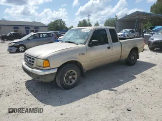2002 Ford Ranger XLT Appearance with VIN 1FTYR44E32TA51614, listed as a Copart auction lot 61653905 with 194,762 mi miles and Salvage title. Bid and sale history available at DreamBid. Image 1.