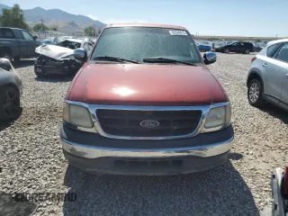 2001 Ford F-150 XLT with VIN 1FTRW07W71KE22482, listed as a Copart auction lot 62546815 with 218,501 mi miles and Clean title. Bid and sale history available at DreamBid. Image 5.