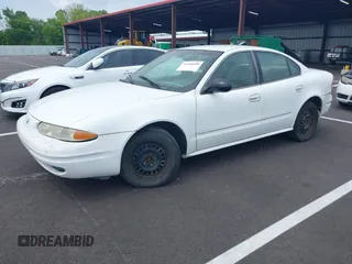2002 Oldsmobile Alero GX z VIN 1G3NK52F22C188987, wystawiony jako IAAI lot #42240189 z przebiegiem 134 891 mil mil oraz . Historia ofert i sprzedaży dostępna na DreamBid. Obrazek 2.