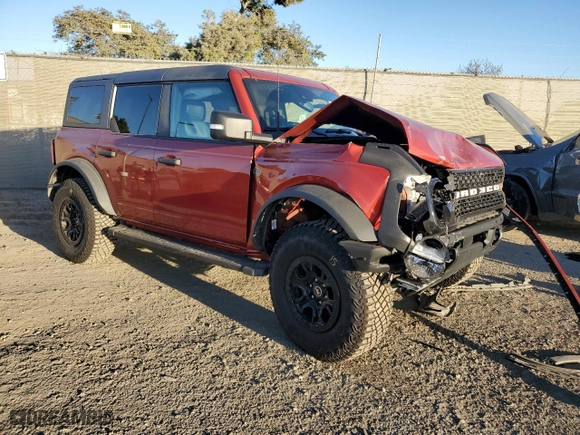 2024 Ford Bronco Wildtrak with VIN 1FMEE2BP5RLA54608, listed as a Copart auction lot 84276804 with 7,011 mi miles and Salvage Title. Bid and sale history available at carsss.com. Image 4.