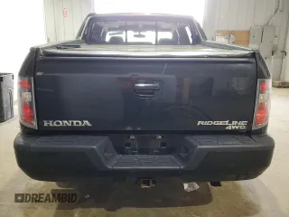 2013 Honda Ridgeline RTL with VIN 5FPYK1F57DB008861, listed as a Copart auction lot 55998335 with 226,567 mi miles and Salvage title. Bid and sale history available at DreamBid. Image 6.