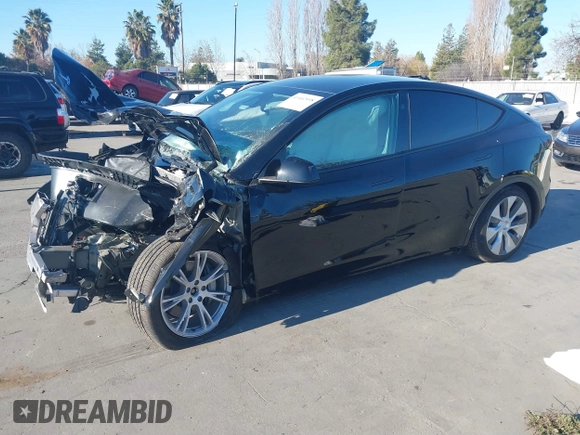 2024 Tesla Model Y Long Range with VIN 7SAYGAEE7RF014424, listed as a IAAI auction lot 41402098 with 6,052 mi miles and . Bid and sale history available at DreamBid. Image 19.