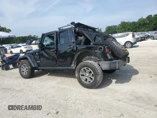 2016 Jeep Wrangler Unlimited Rubicon with VIN 1C4BJWFG7GL320650, listed as a Copart auction lot 53900195 with 77,620 mi miles and Salvage title. Bid and sale history available at DreamBid. Image 2.