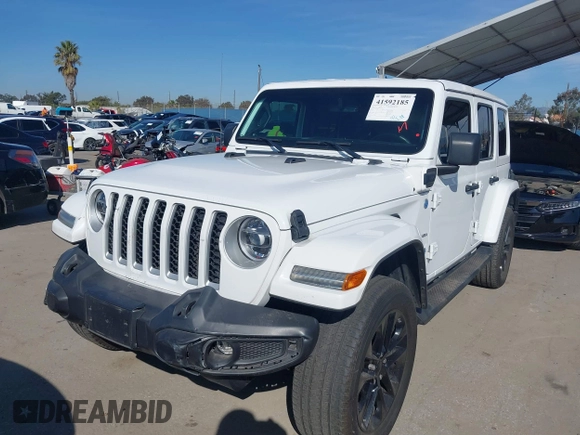 2021 Jeep Wrangler Unlimited Sahara z VIN 1C4JJXP6XMW765398, wystawiony jako IAAI lot #41592185 z przebiegiem 26 834 mil mil oraz . Historia ofert i sprzedaży dostępna na DreamBid. Obrazek 17.
