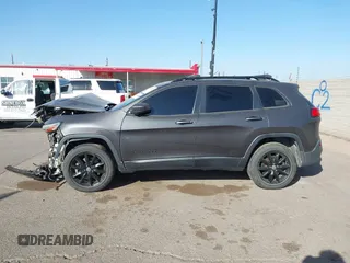 2014 Jeep Cherokee Latitude with VIN 1C4PJMCBXEW317384, listed as a IAAI auction lot 41621635 with 180,971 mi miles and . Bid and sale history available at DreamBid. Image 15.