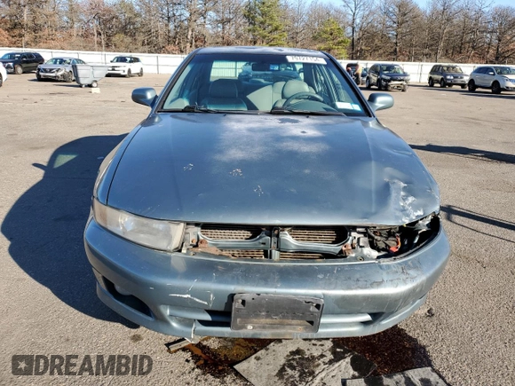 2000 Mitsubishi Galant LS with VIN 4A3AA56LXYE174881, listed as a Copart auction lot 79727154 with 106,001 mi miles and Salvage Title. Bid and sale history available at carsss.com. Image 5.