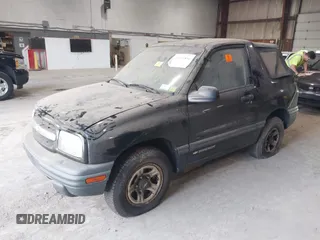 1999 Chevrolet Tracker z VIN 2CNBE18CXX6919189, wystawiony jako IAAI lot #42196856 z przebiegiem Nie podano mil oraz . Historia ofert i sprzedaży dostępna na DreamBid. Obrazek 2.