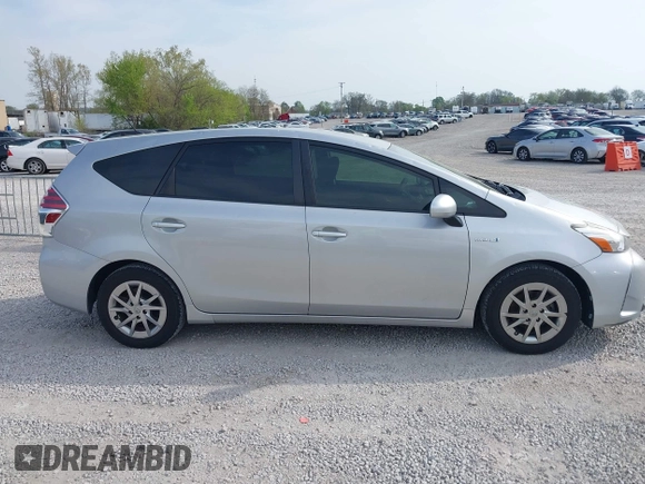 2015 Toyota Prius Two with VIN JTDZN3EUXFJ026954, listed as a IAAI auction lot 41980948 with 128,870 mi miles and . Bid and sale history available at DreamBid. Image 13.