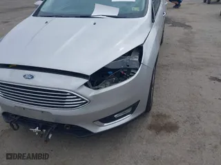 2015 Ford Focus Titanium with VIN 1FADP3N27FL228549, listed as a IAAI auction lot 41912941 with 69,025 mi miles. Bid and sale history available at carsss.com. Image 6.
