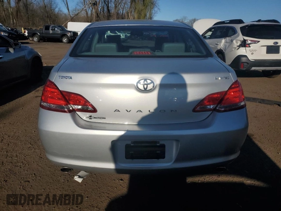 2005 Toyota Avalon XL z VIN 4T1BK36B65U047400, wystawiony jako Copart lot #48930625 z przebiegiem 170 252 mil mil oraz Szkoda całkowita • Salvage title. Historia ofert i sprzedaży dostępna na DreamBid. Obrazek 6.