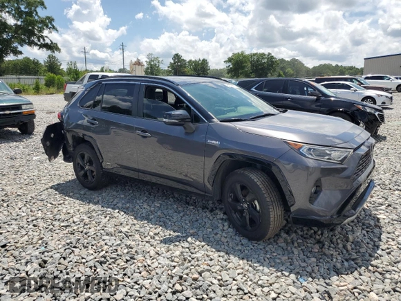 2019 Toyota RAV4 Hybrid XSE with VIN JTMEWRFV4KJ004271, listed as a Copart auction lot 61335175 with 116,457 mi miles and Salvage title. Bid and sale history available at DreamBid. Image 4.
