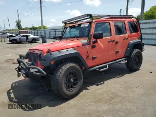 2013 Jeep Wrangler Unlimited Moab with VIN 1C4BJWEG4DL590867, listed as a Copart auction lot 57966275 with 160,552 mi miles and Salvage title. Bid and sale history available at DreamBid. Image 1.