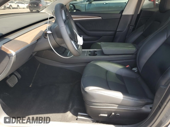 2023 Tesla Model 3 with VIN 5YJ3E1EA8PF616210, listed as a Copart auction lot 49340685 with 38,483 mi miles and Salvage Title. Bid and sale history available at DreamBid. Image 7.