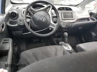 2009 Honda Fit Sport z VIN JHMGE88619S045049, wystawiony jako Copart lot #54223135 z przebiegiem 107 601 mil mil oraz Szkoda całkowita • Salvage title. Historia ofert i sprzedaży dostępna na DreamBid. Obrazek 8.